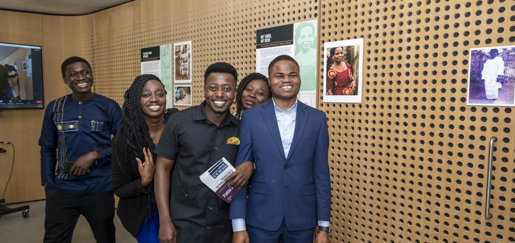 a group of people smiling at the camera